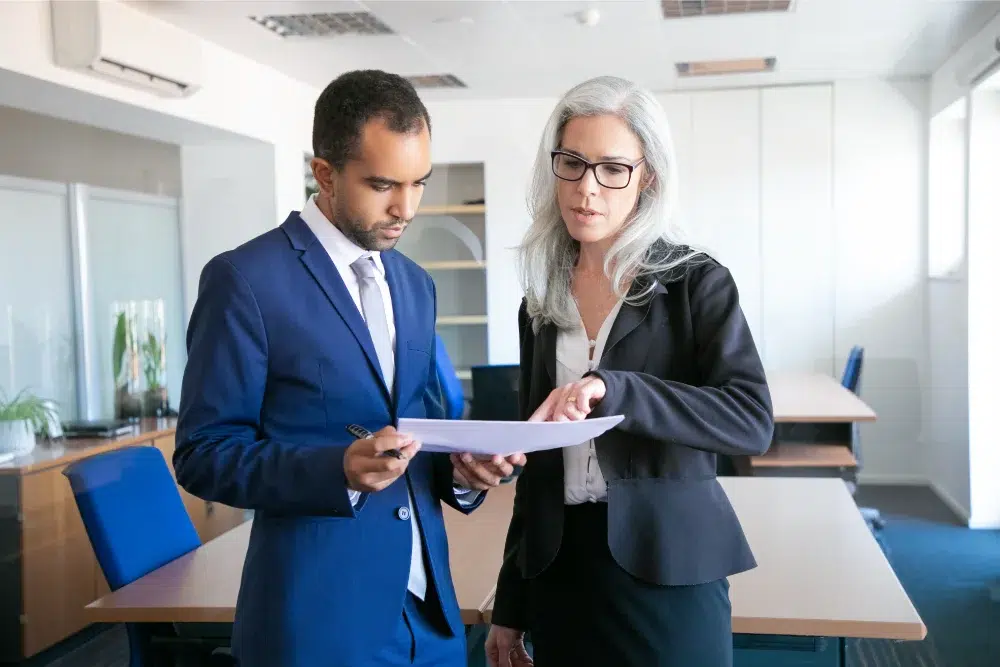proposal writer taking advice from professional experienced proposal consultant Management Volume